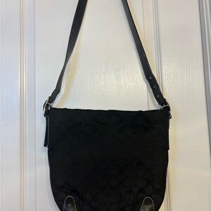 Vintage Coach Black Shoulder Bag with Adjustable Strap.